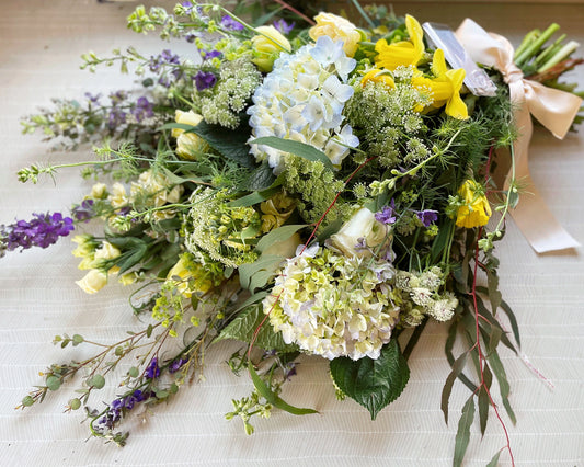 A tied sheaf for a funeral. A foam free, natural design.