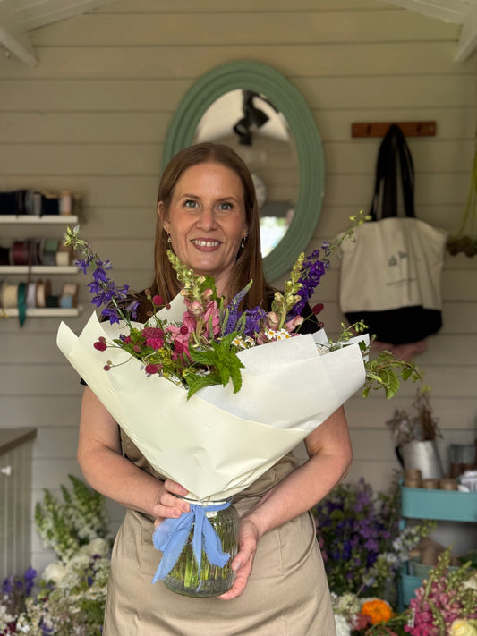 Alison Matthew’s holding a completed bouquet ready to be delivered.
