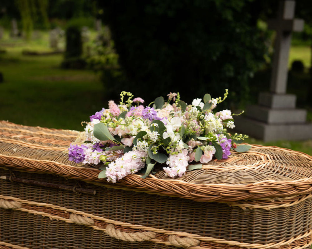 A pretty wreath tribute for a funeral. made with Lancashire grown flowers on a foam free base.