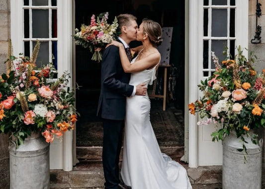 photo by @victoriabakerphotographer of Laura and Joe’s beautiful wedding day. Including milk churn floral designs.