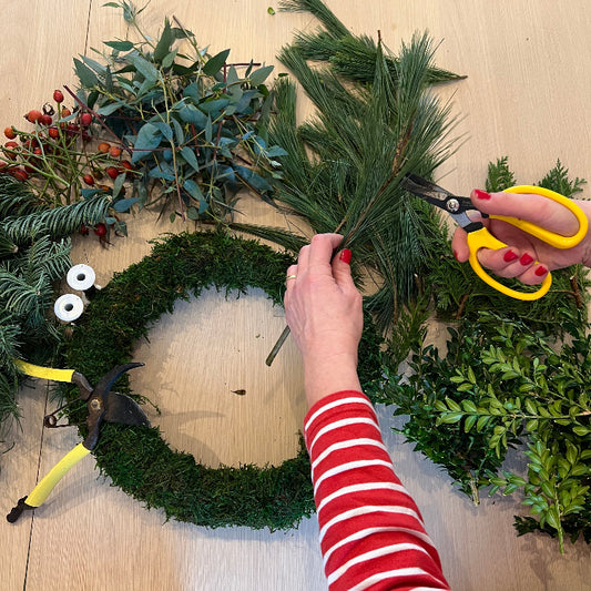 Make your very own Christmas door wreath.