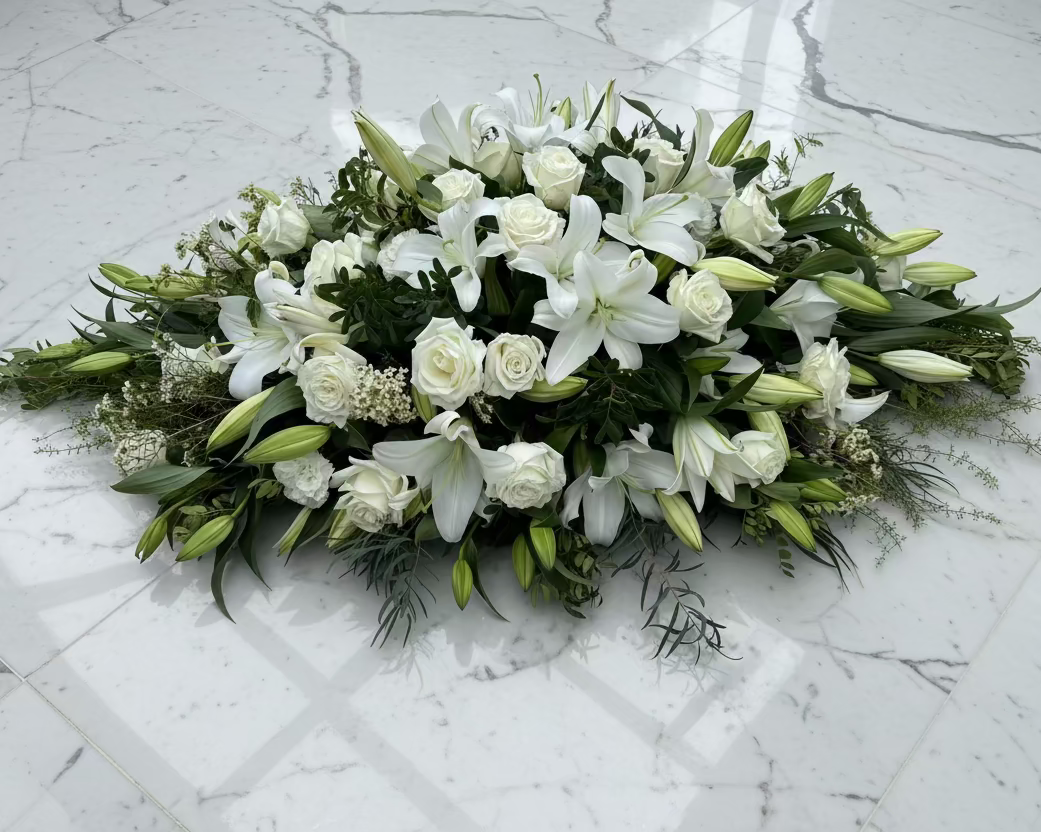White funeral flowers - lilies and Roses