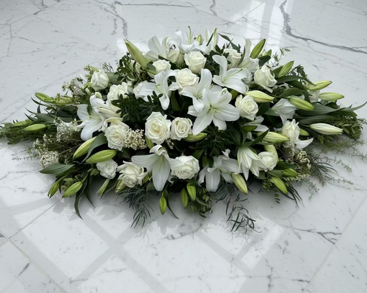 White funeral flowers - lilies and Roses