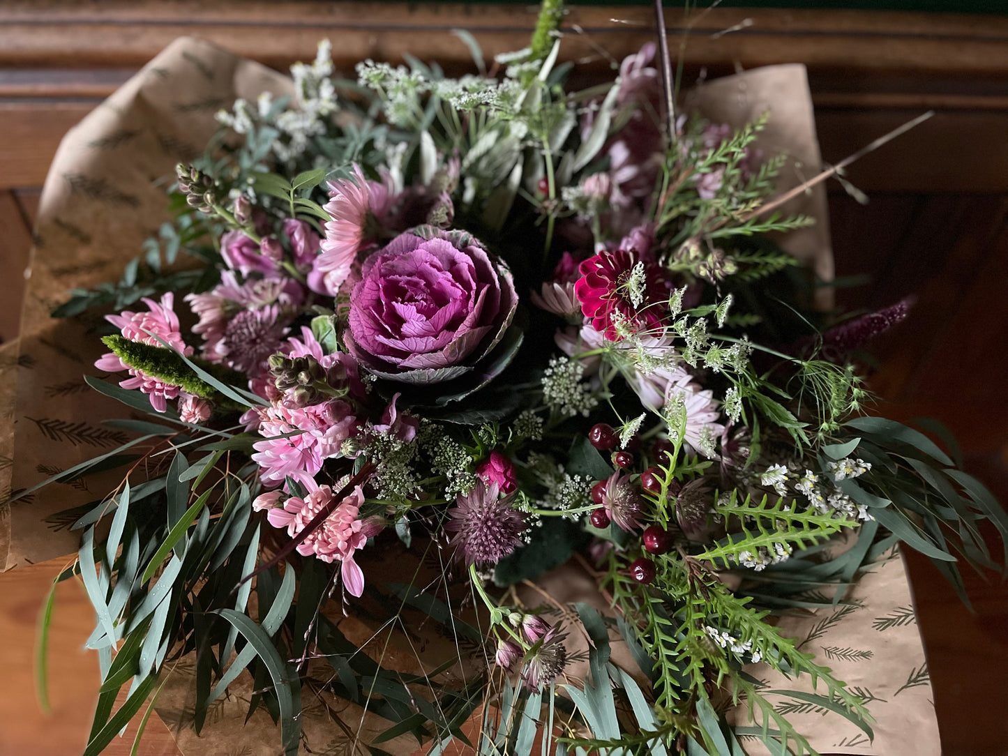 A bouquet of winter flowers including Brassica and Chrysanthemums