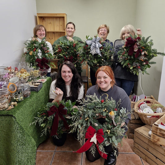 come and learn how to make your very own Christmas door wreath, like these lovely ladies did.